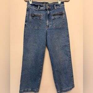 Express Women’s 70s style wide leg hi rise jeans. Size 4